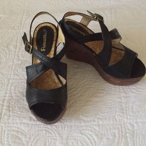 Black wedges with rose accented heel